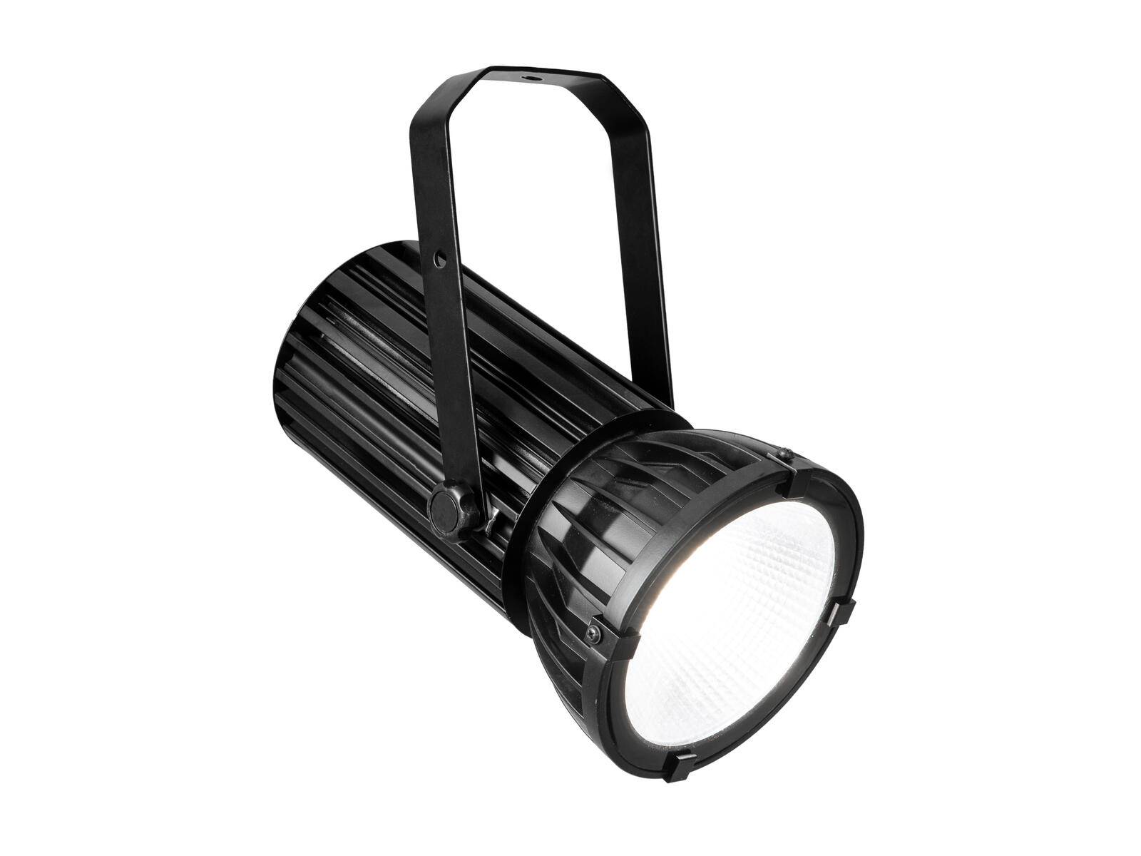 Eine schwarze Bühnenspotlampe mit einem Griff, nach vorne gerichtet und eingeschaltet, die geradeaus leuchtet.