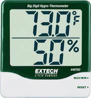 Digitales Hygrometer-Thermometer-Display, das '73,0°F' Temperatur und '50%' Luftfeuchtigkeit anzeigt. Grün-weiße Vorrichtung mit Tasten, die mit MAX/MIN und RESET beschriftet sind.