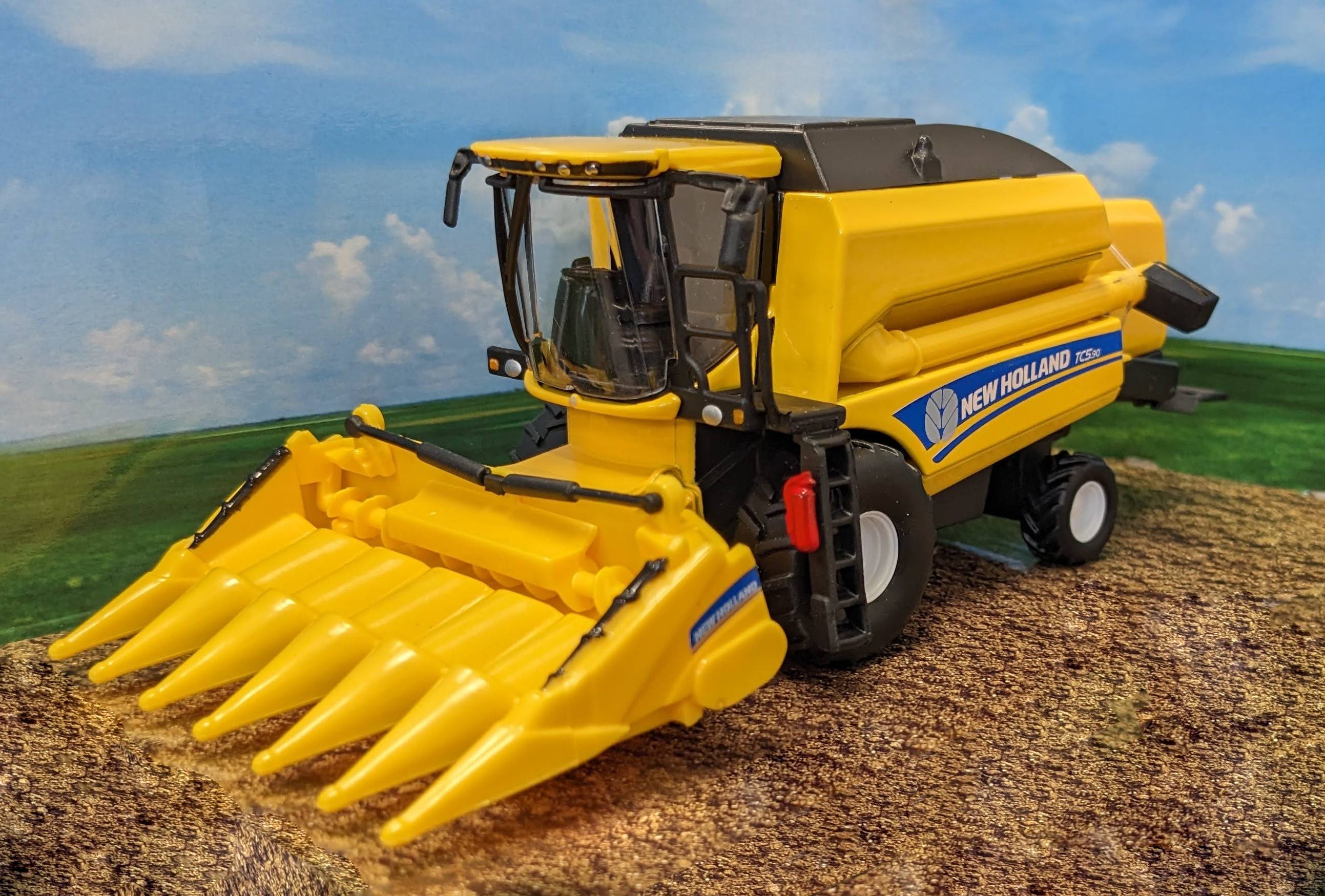 Bburago 18-31722 - New Holland - Mähdrescher TC5.90 für Mais (gelb) Spielzeugmähdrescher Modell