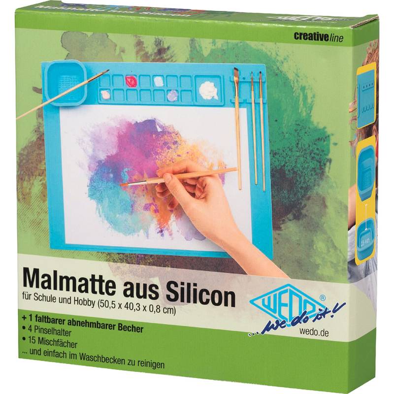 Verpackung für das 'Wedo' Silikon-Malunterlage, die eine Hand beim Aquarellmalen zeigt. Enthält Becherhalter, vier Pinsel und eine Mischpalette.