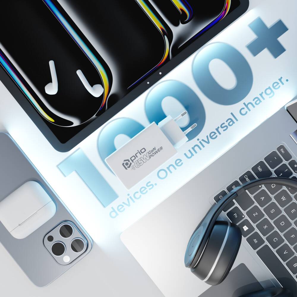 Ein Schreibtisch mit Technik-Gadgets, Kopfhörern und einer Phrase 