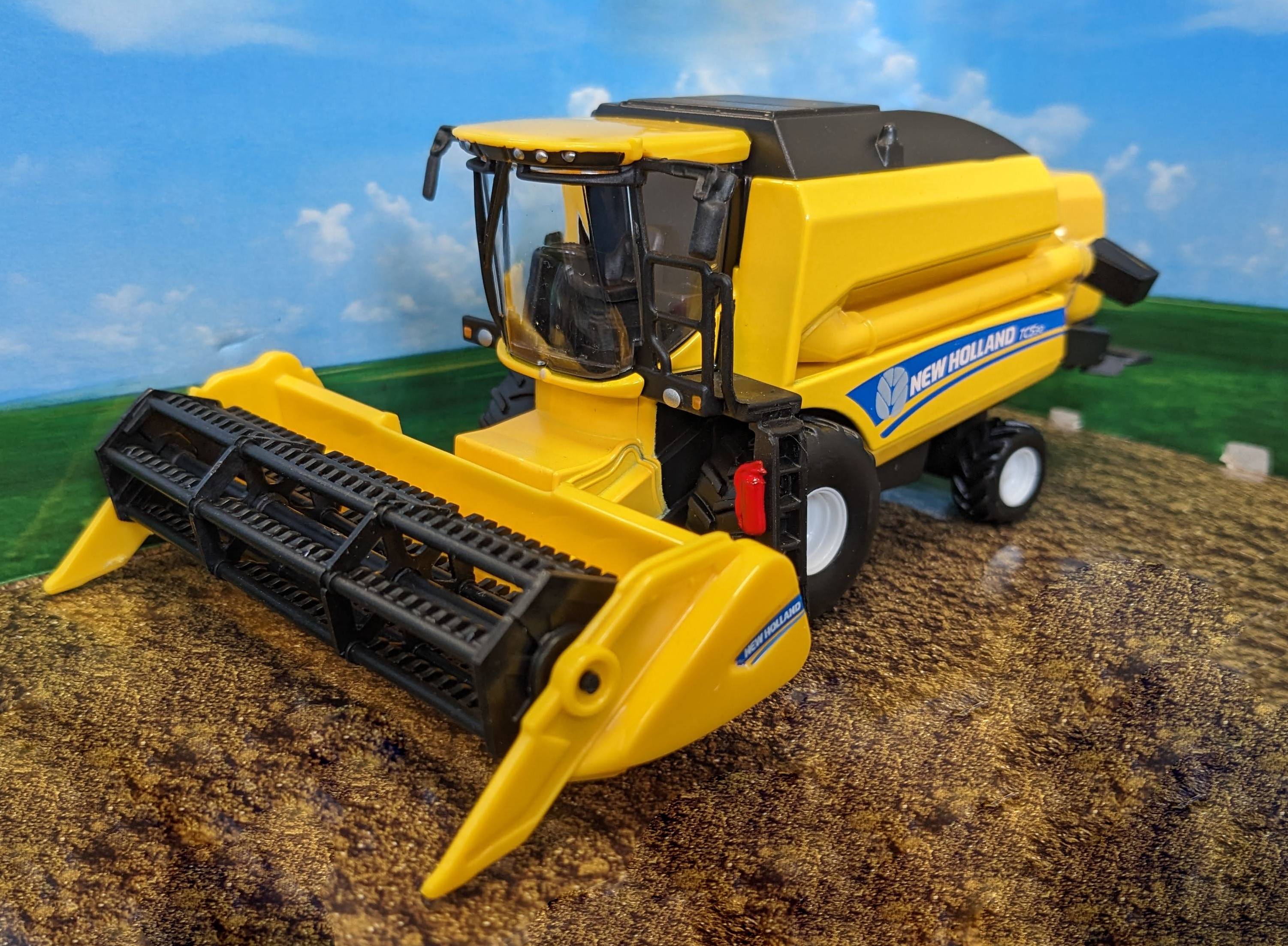Bburago 18-31721 - New Holland - Mähdrescher TC5.90 für Getreide (gelb) Spielzeugmähdrescher Modell