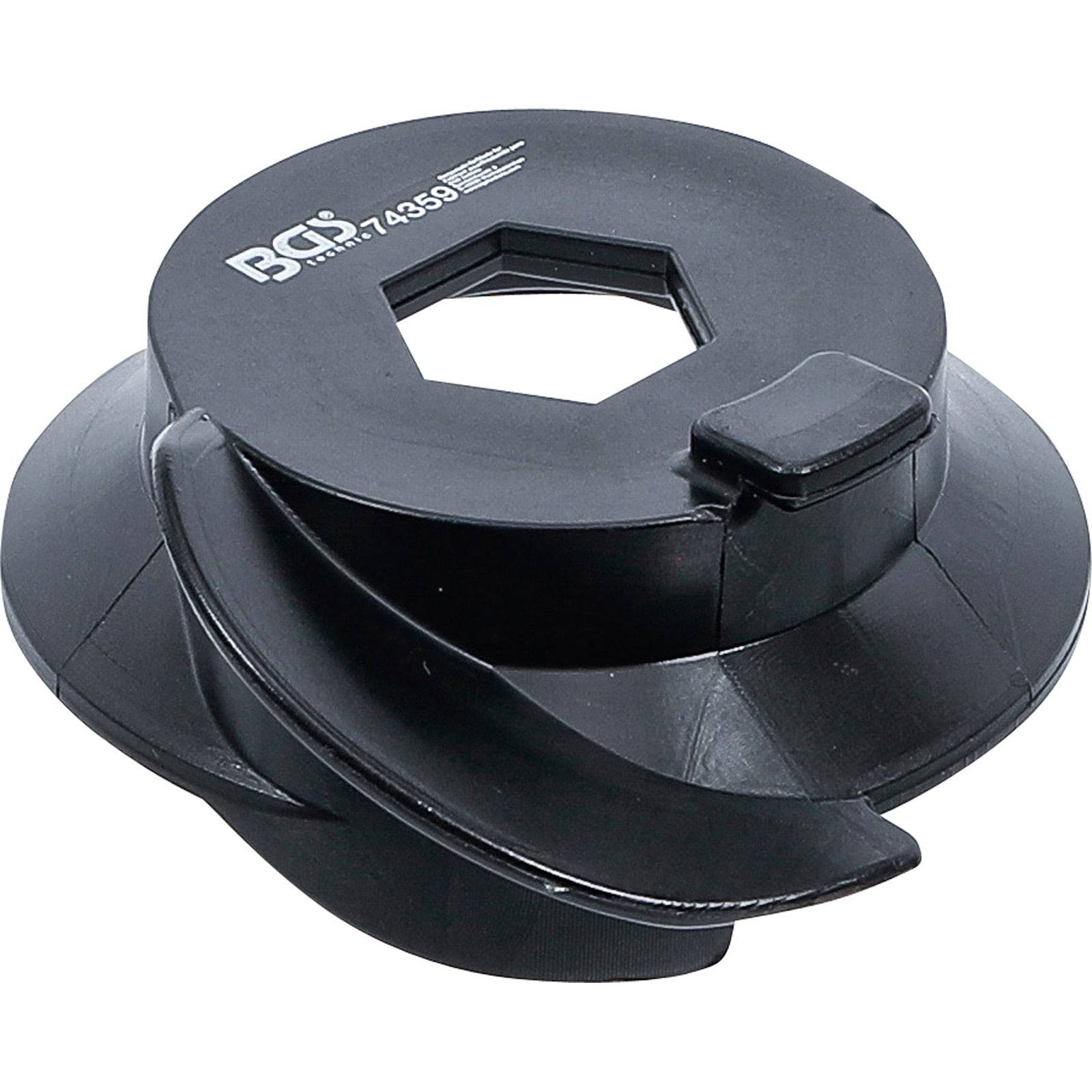 Ein schwarzer Ölfilterschlüssel, der für eine einfache Entfernung von Ölfiltern konzipiert ist und eine kreisförmige Konstruktion mit abgeschrägten Kanten zur besseren Griffigkeit aufweist.