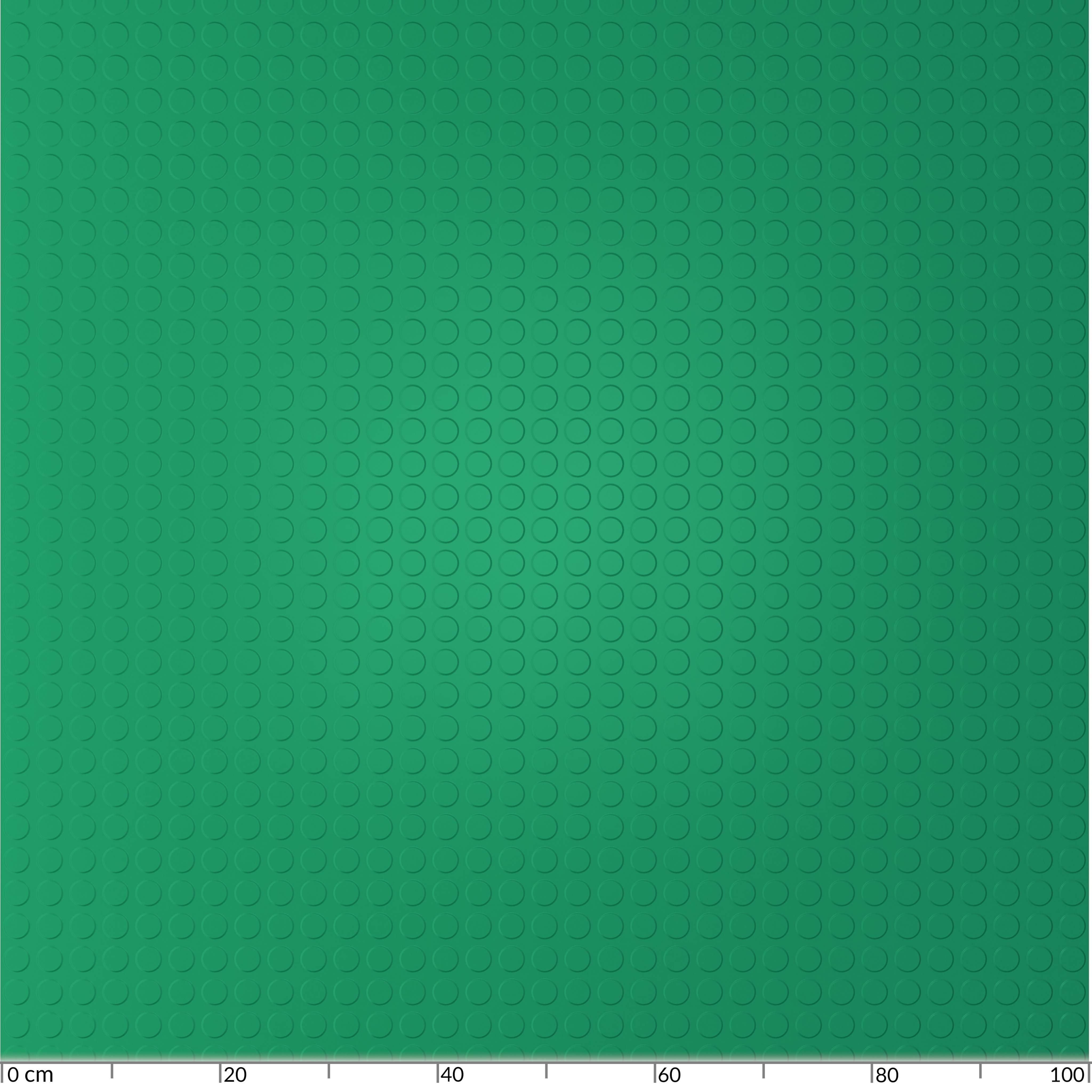 Ein grünes Millimeterpapier-Gitter mit konzentrischem Kreismuster und einer Linealskalierung am unteren Rand mit Markierungen von 0 bis 100 cm.