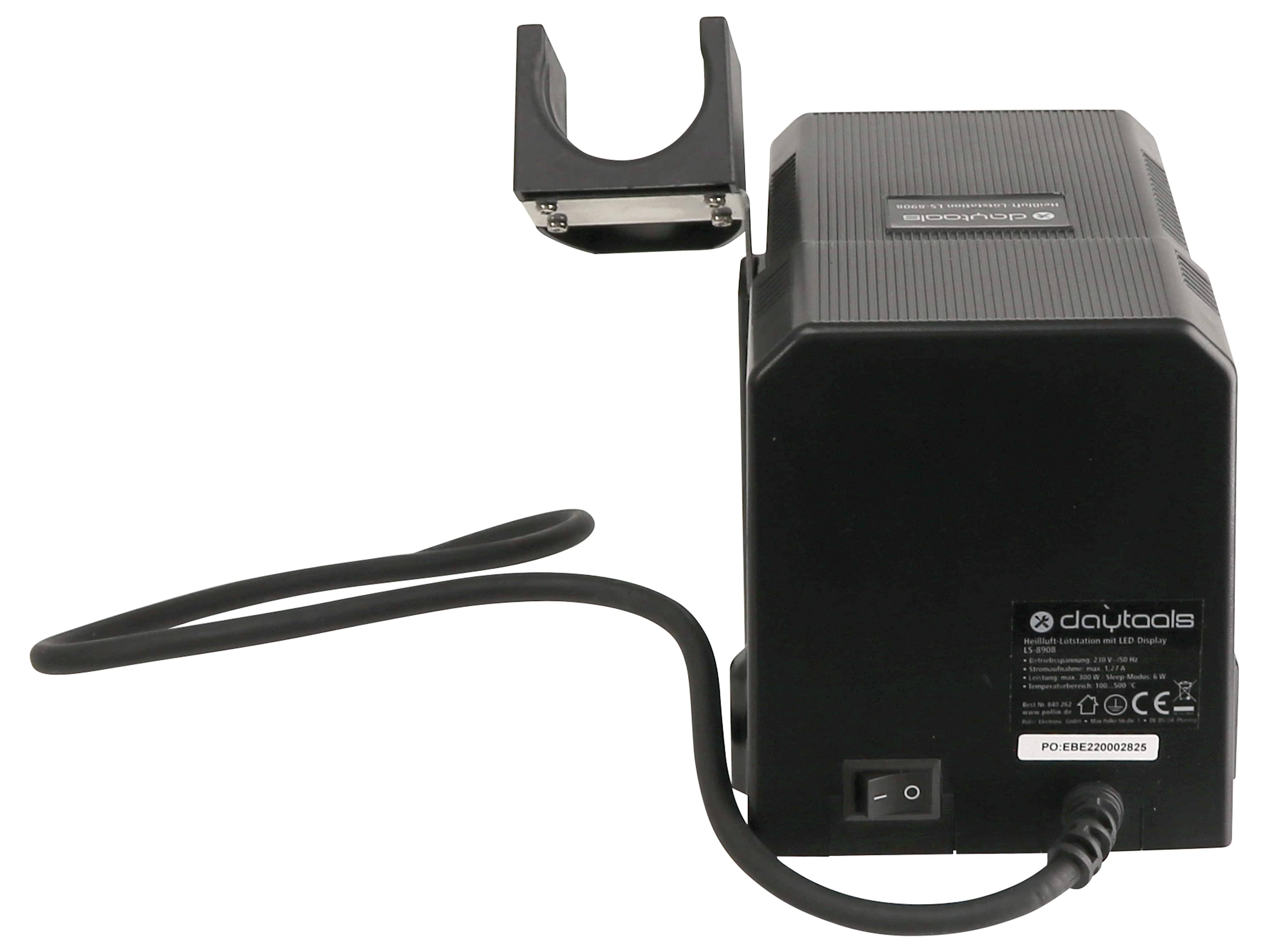 Ein schwarzes elektronisches Gerät mit einem Stromschalter und einem angeschlossenen Kabel. Es enthält ein abnehmbares Bauteil mit einer Metallklemme.