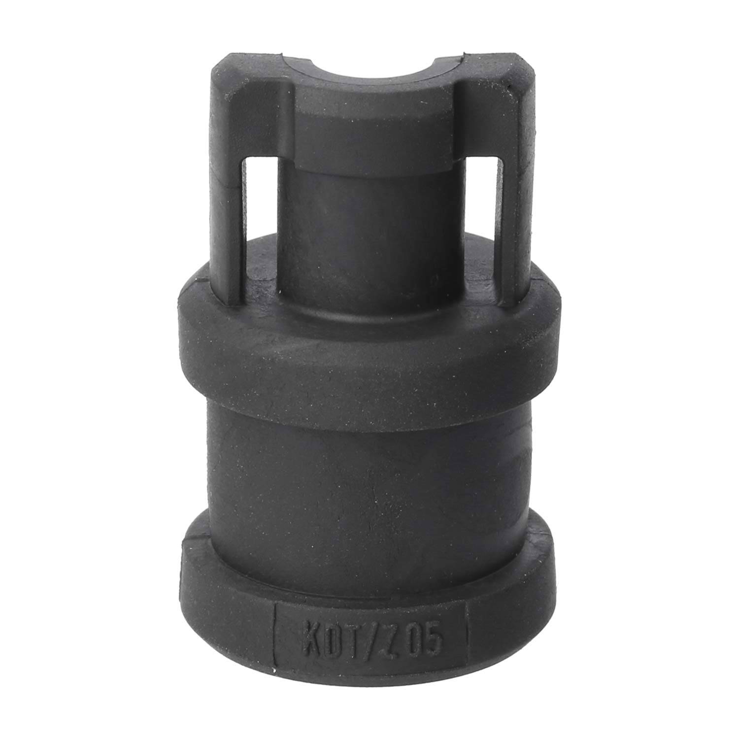 Ein schwarzes, rundes Metallobjekt mit einer Öffnung an der Oberseite und zwei vertikalen Zinken, das von der Seite betrachtet wie ein Steckdoseneinsatz oder eine Werkzeuganbindung aussieht.