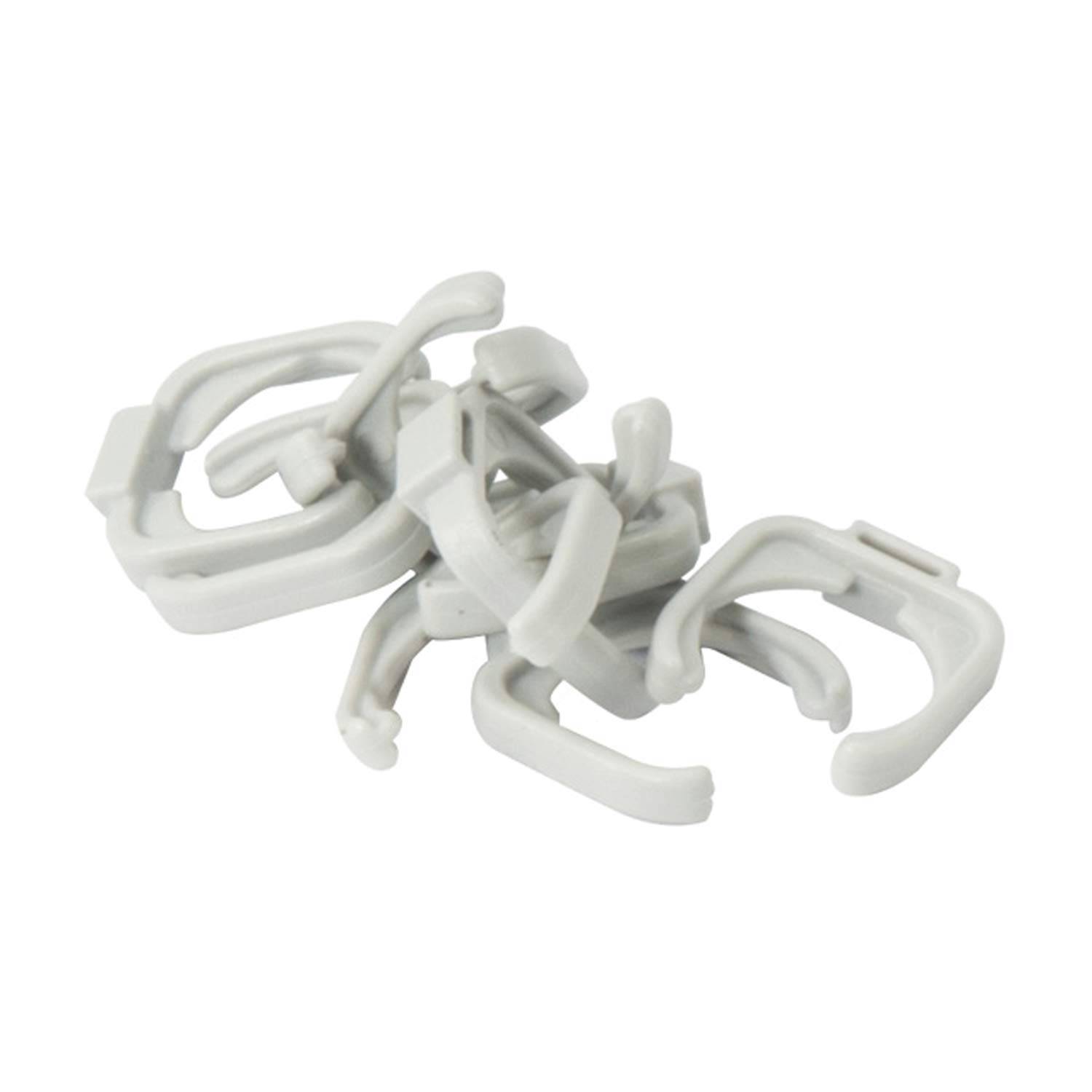 Eine graue, rechteckige Kunststoffkomponente mit einer gewindelten kreisförmigen Öffnung oben, wahrscheinlich ein Stecker oder Adapter für eine mechanische oder Sanitäranwendung.