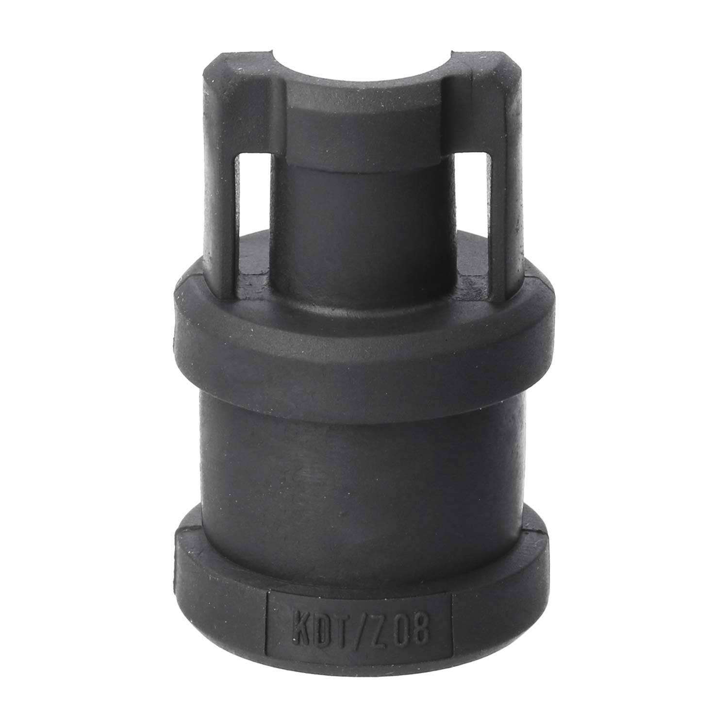 Eine schwarze Gummidichtungsmanschette für Ventilstiele, die in der Automobilindustrie verwendet wird, um Ventilstiele zu dichten und zu schützen, in aufrechter Position dargestellt.