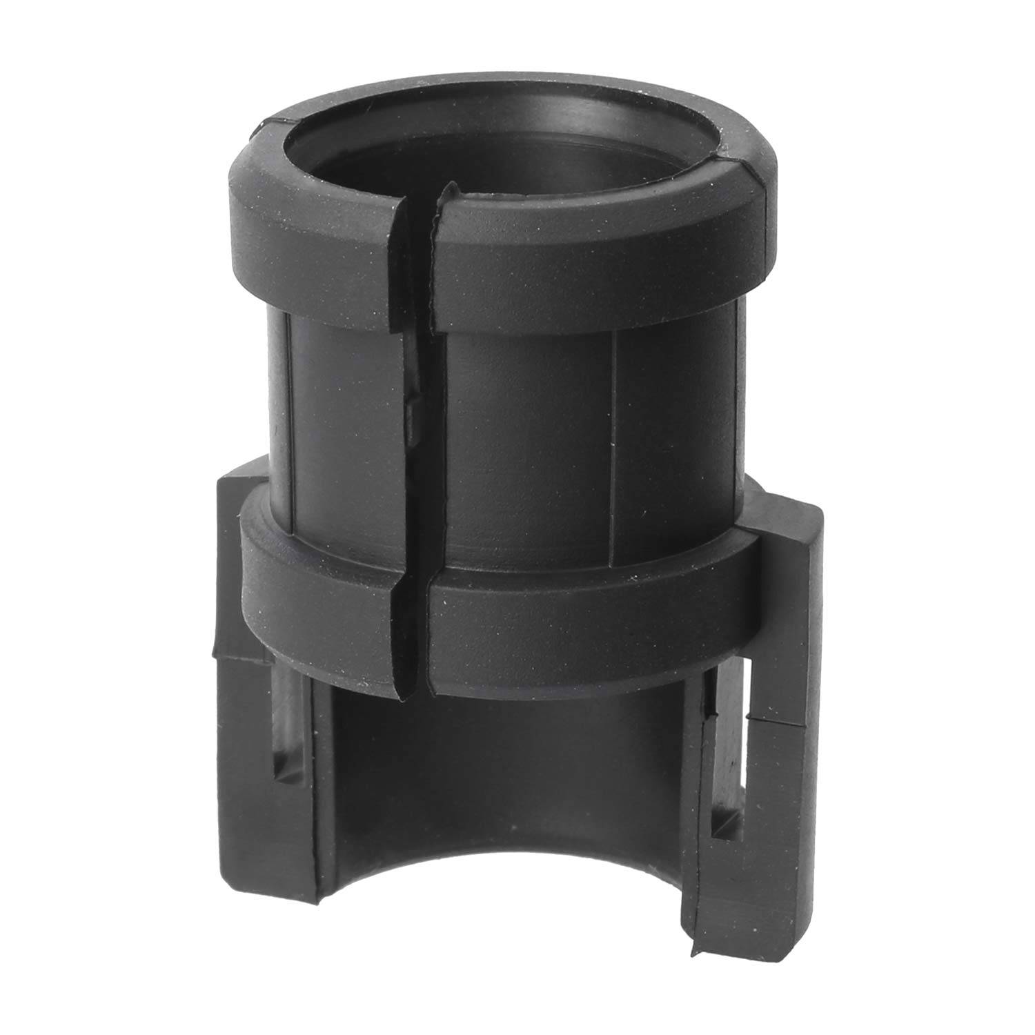 Ein schwarzer Plastikzylinder mit einem vertikalen Schlitz an einer Seite, der als Kabel- oder Rohrklemme verwendet wird.