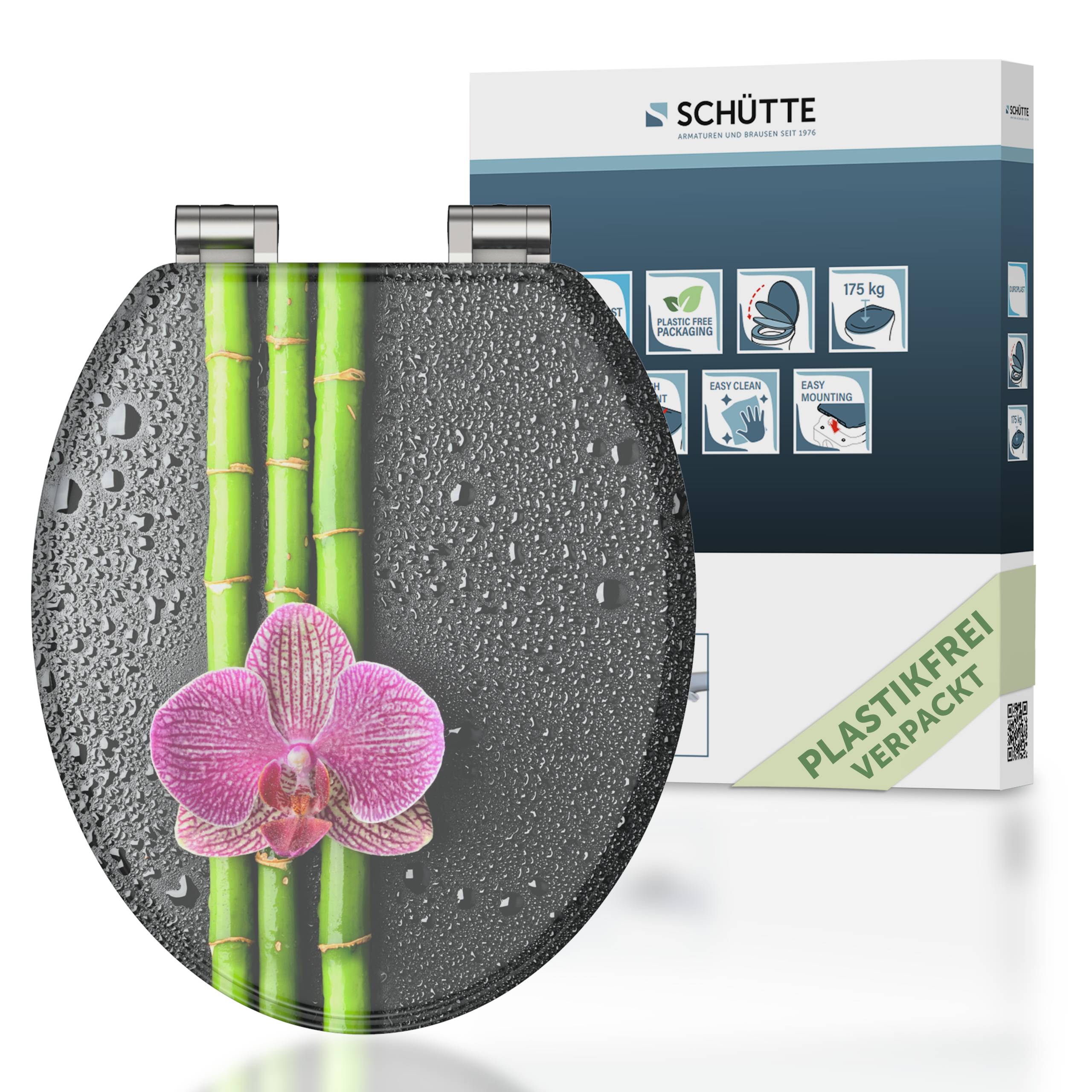 Toilettensitz mit Bambus- und Orchideendesign, die Verpackung zeigt folgende Merkmale: einfaches Schließen, leichte Reinigung und Tragfähigkeit von 175 kg.