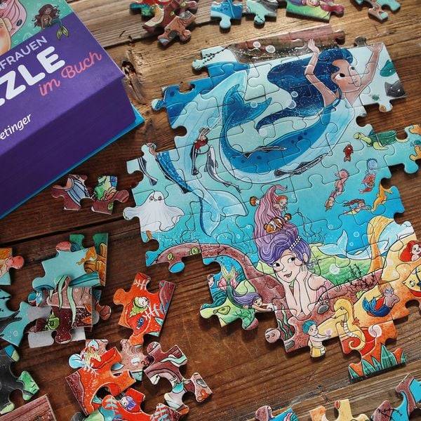 Meerjungfrauen. Puzzle im Buch. 100 Teile