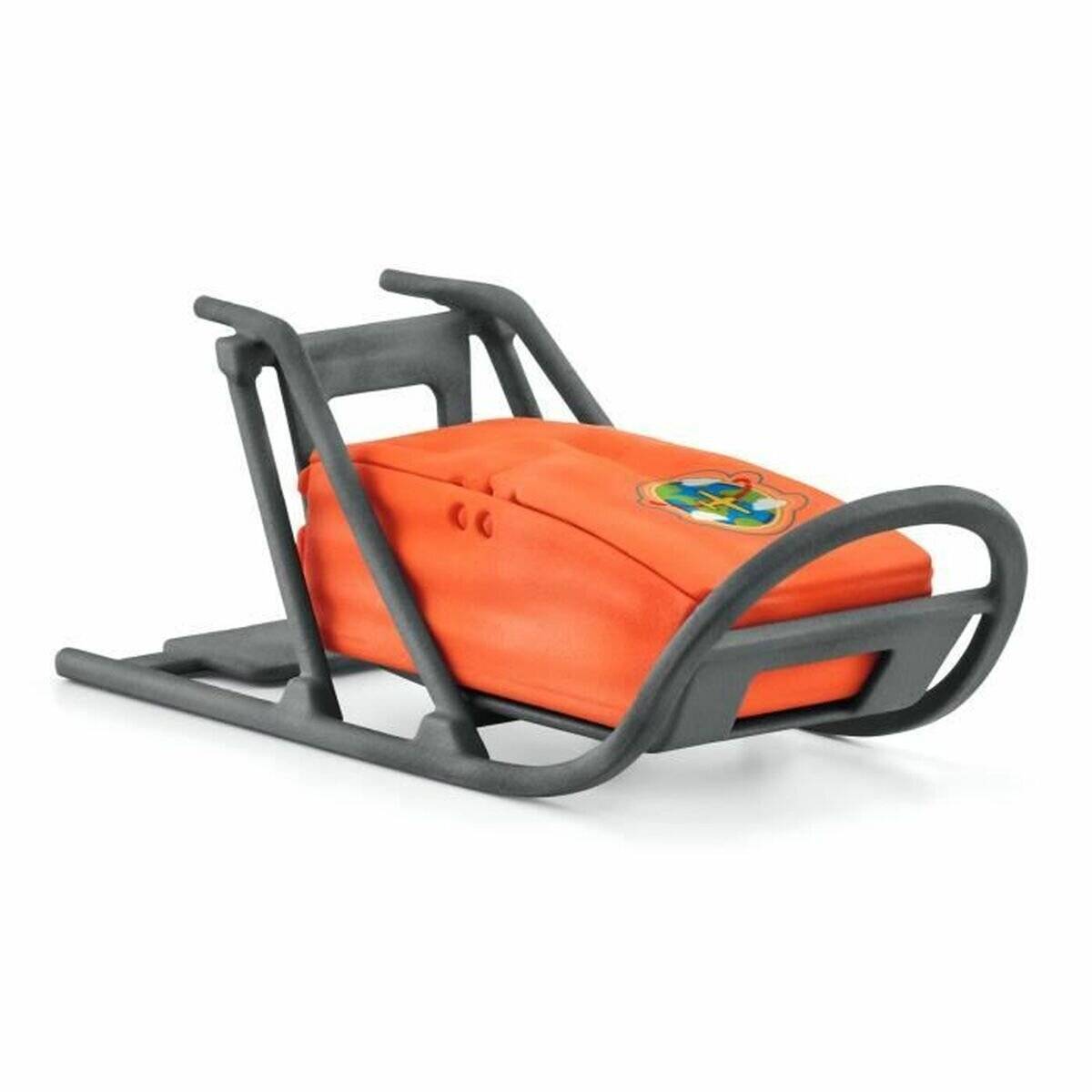 Orange-rote Rettungstrage oder Krankentrage in einem grauen Metallrahmen, die zum Transportieren einer verletzten Person verwendet wird.