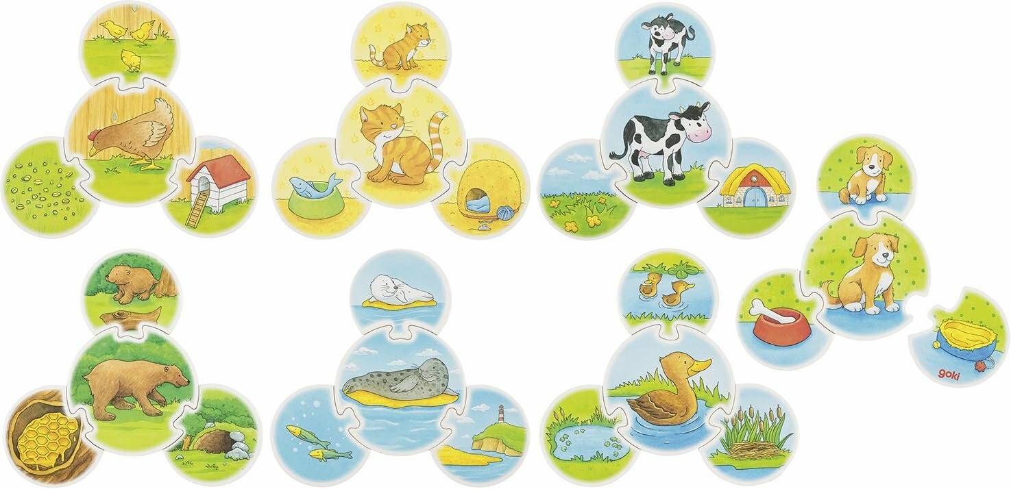 Drei Jigsaw-Puzzle-Sets zeigen jeweils Tiere: eine Katze mit Objekten wie einem Fisch, eine Kuh mit Scheunenszenerie und eine Ente mit Entenküken und Wasser.