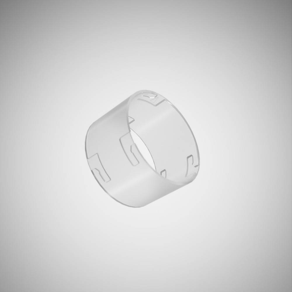 Ein transparenter zylindrischer Ring mit gleichmäßig verteilten Aussparungen, der vor einem grauen Verlaufshintergrund betrachtet wird.