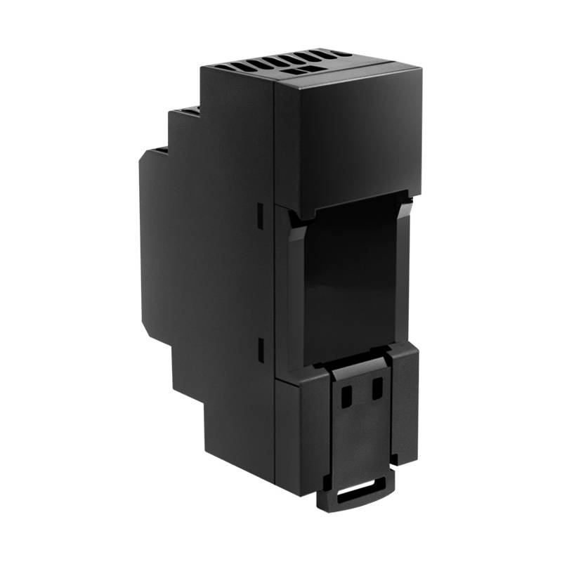 Ein schwarzes elektronisches Modul mit belüfteter Oberseite, vertikal positioniert. Es scheint eine Komponente für ein industrielles oder kommerzielles System zu sein.