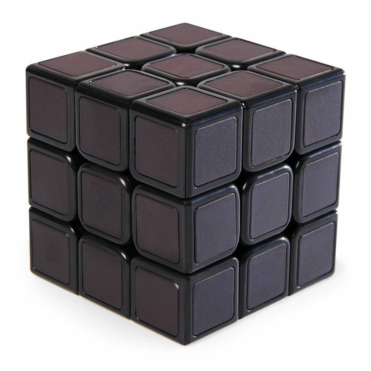 Ein schwarzer, teilweise durcheinander gewürfelter Rubik's Cube auf weißem Hintergrund.