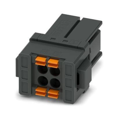 Ein schwarzer Stecker mit orangefarbenen Akzenten, der vier kreisförmige Buchsen in der Mitte aufweist.