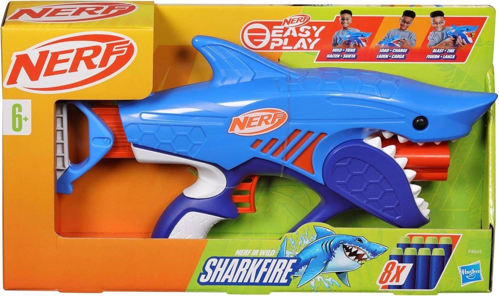 Nerf Sharkfire Spielzeug-Dartblaster in blauer und lila Verpackung, mit der Aufschrift „8x", einem Haigrafik und Altersangabe 6+.
