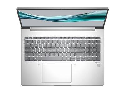 Ein silberner Laptop mit einer vollständigen Tastatur und einem Trackpad, von oben betrachtet, mit einem gewellten Muster auf dem Bildschirm.