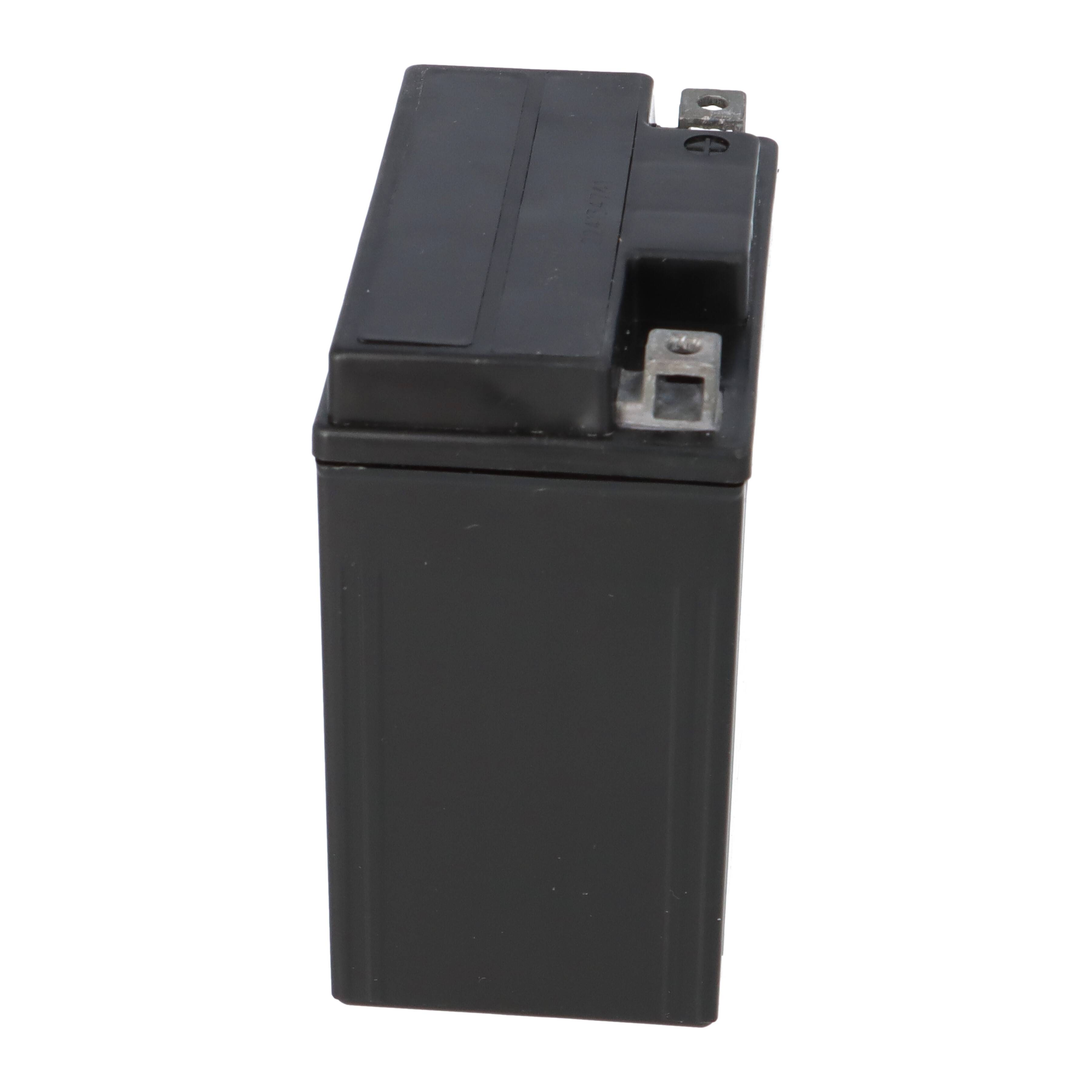 Eine schwarze rechteckige Batterie mit Metallkontakten oben.