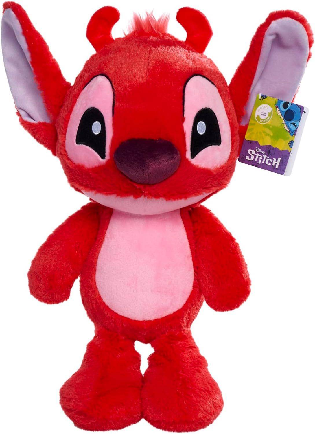 Ein rotes Plüschtier eines Alien-Charakters mit großen Ohren und einem rosa Bauch. Es ähnelt einer Figur aus dem Film „Lilo & Stitch