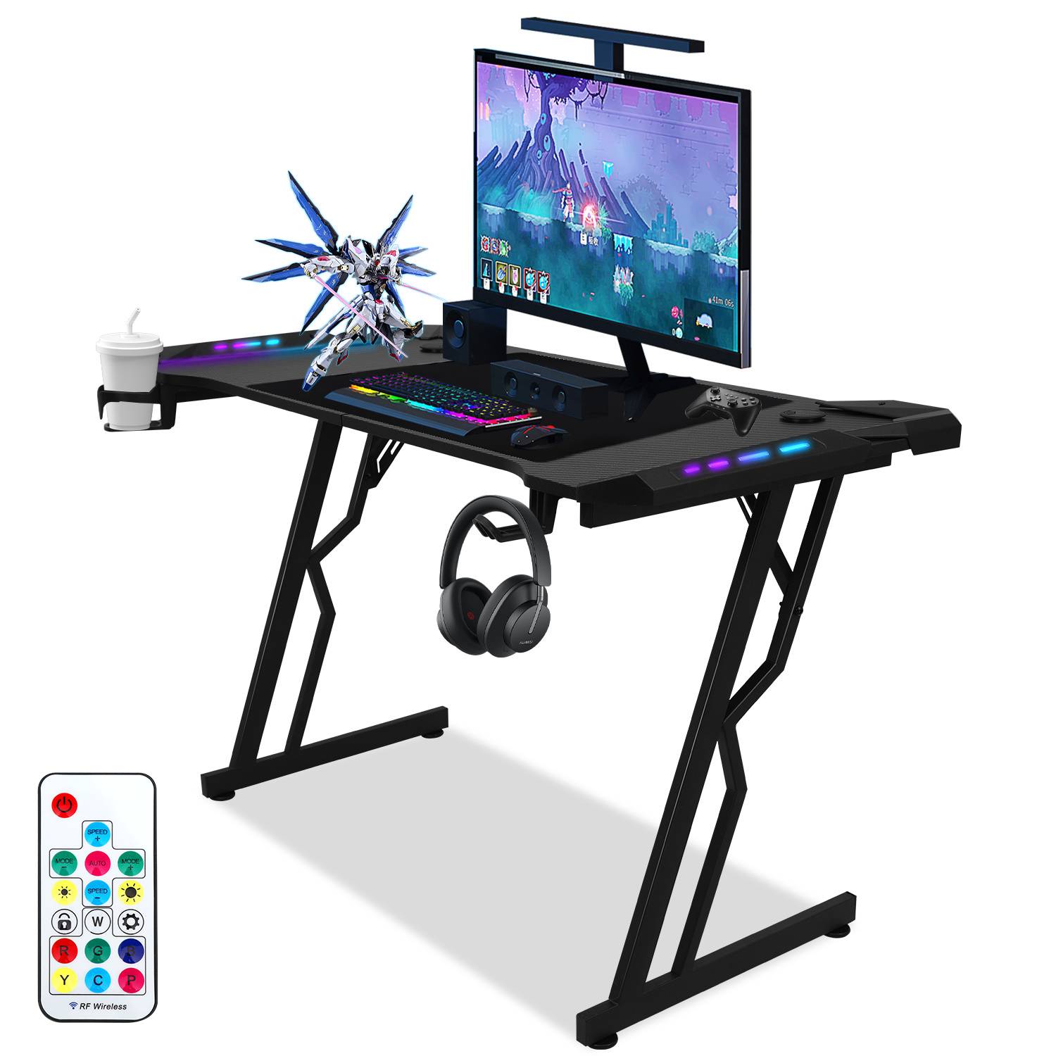 Spielschreibtisch-Set mit Monitor, RGB-Tastatur, Kopfhörer, Getränkehalter, Figur und mitgelieferter drahtloser RGB-Fernbedienung.