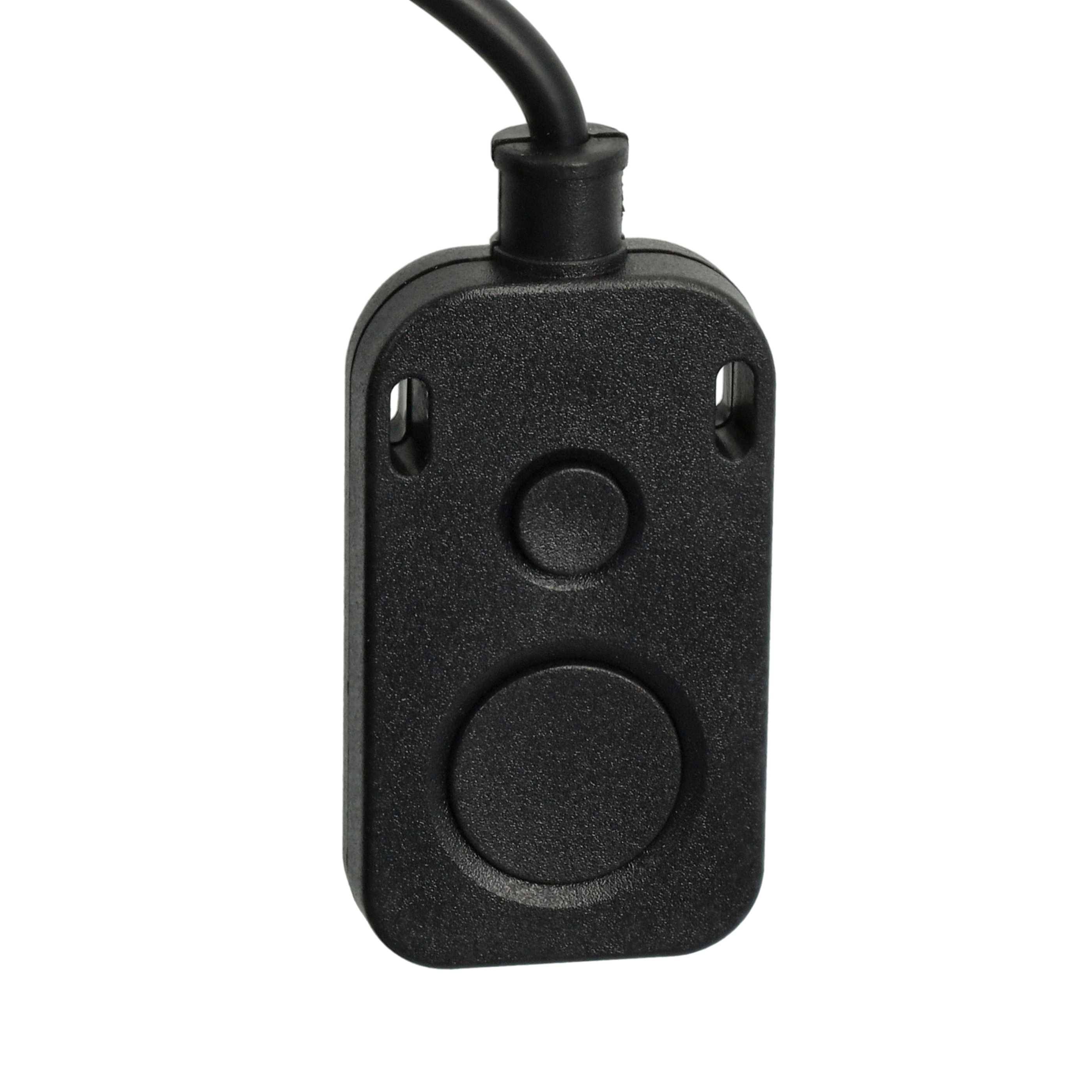 Eine schwarze Fernbedienung mit zwei runden Tasten und einem Kabel, das oben herauskommt, zum Bedienen eines Geräts.