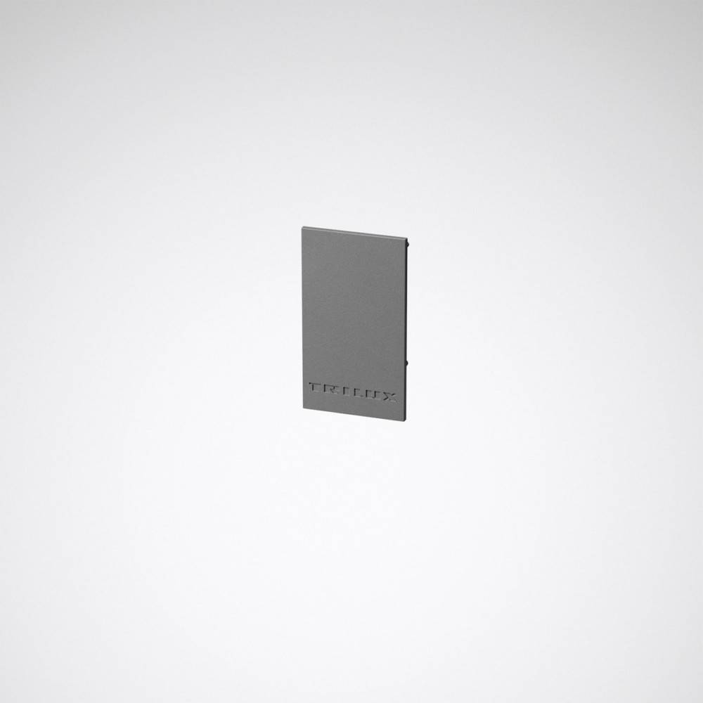 Ein grauer rechteckiger 3D-Gegenstand ist auf einem schlichten weißen Hintergrund zentriert und weist eine Reihe kleiner, eingesenkter Quadrate nahe der unteren Kante auf.