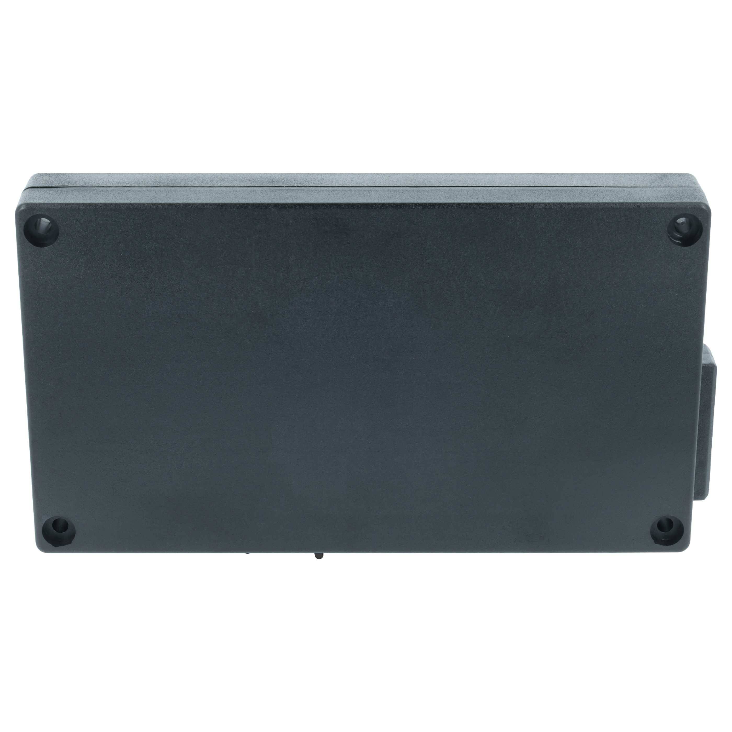 Rechteckige schwarze Box mit vier Schrauben, höchstwahrscheinlich ein technisches oder elektronisches Gerät, von oben betrachtet.