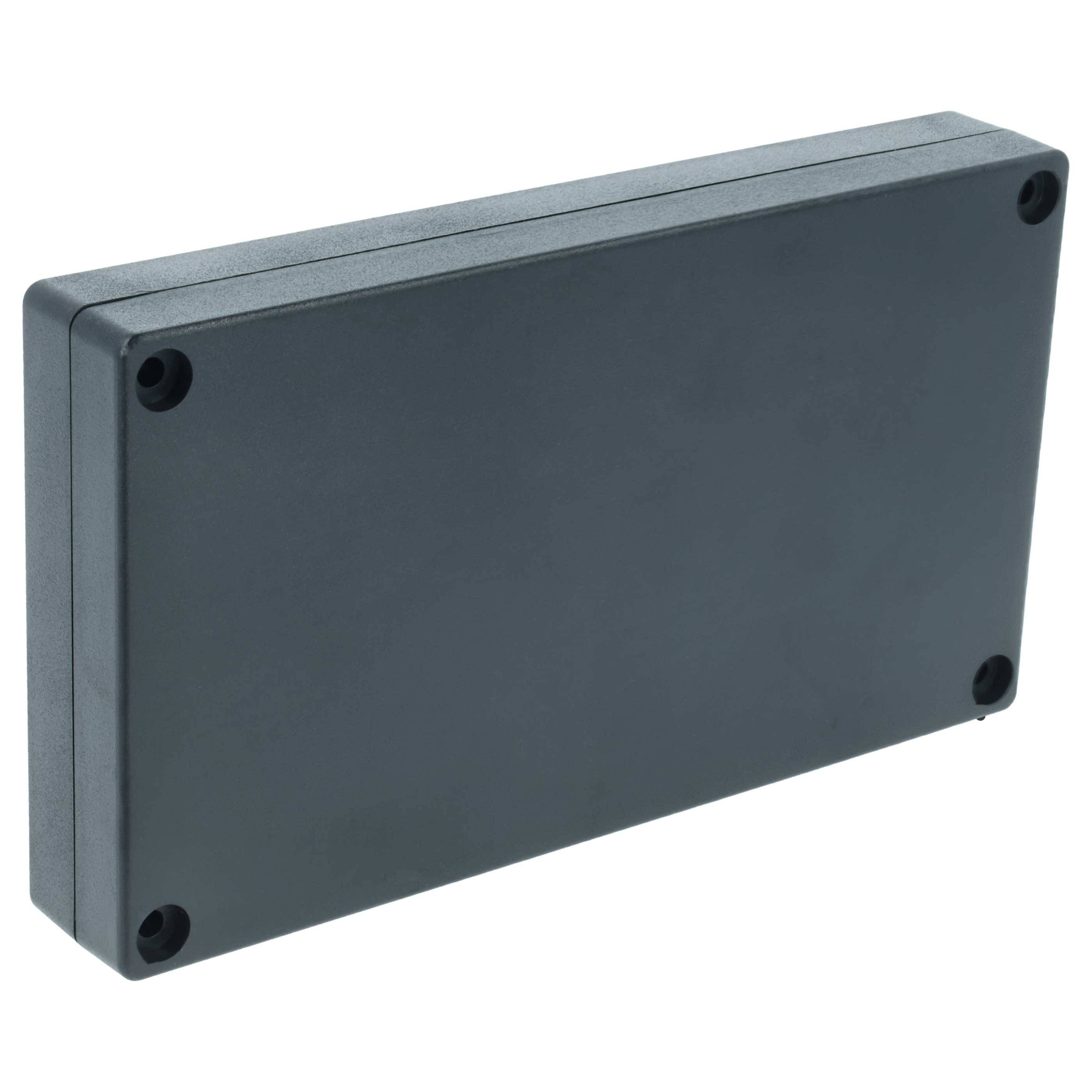 Eine schwarze rechteckige Kunststoffgehäuse mit abgerundeten Kanten, ausgestattet mit Schraublöchern an jeder Ecke.