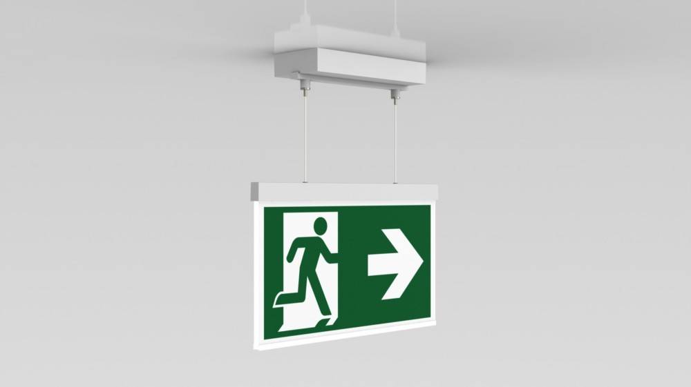 Notausgangsschild mit einer Person, die auf eine Tür mit einem Pfeil nach rechts zulaufend dargestellt ist und die Richtung für eine Evakuierung anzeigt.