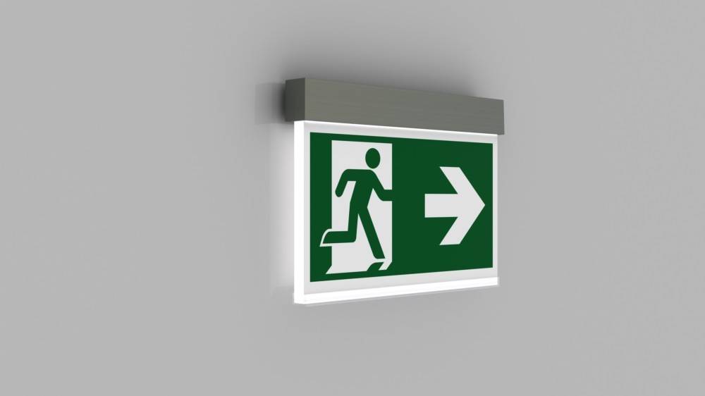 Fluchtzeichenschild mit einer laufenden Figur und einem nach rechts weisenden Pfeil auf grünem Hintergrund, der die Richtung zum Notausgang anzeigt.