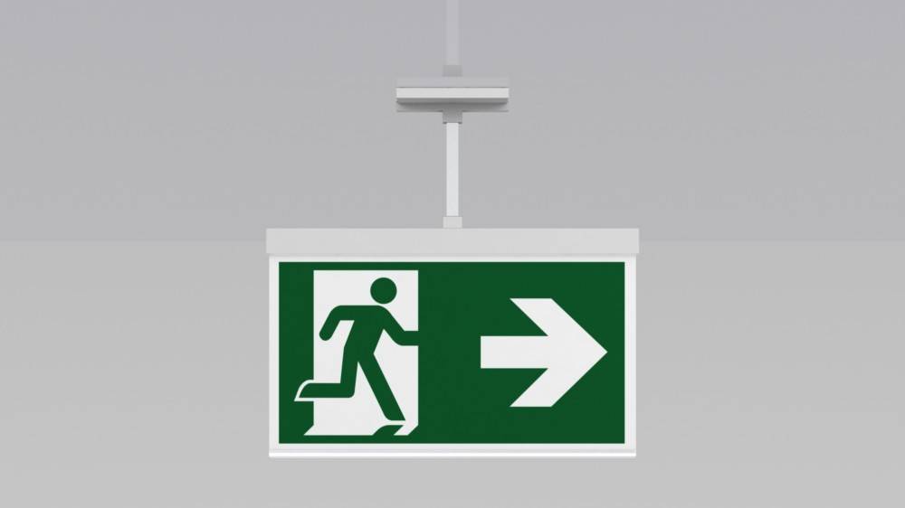 Notausgang-Schild mit einer laufenden Person und einem nach rechts zeigenden Pfeil.