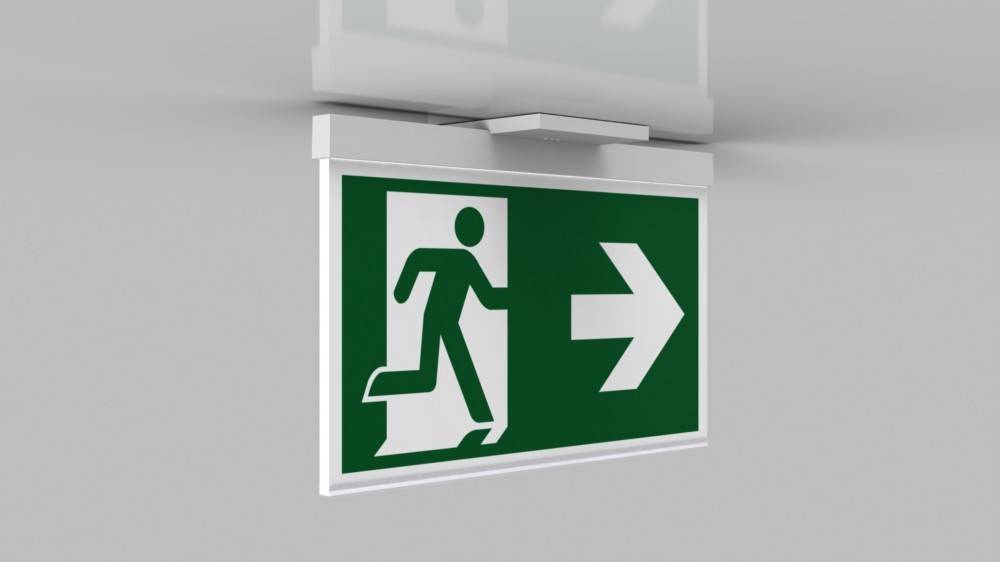 Notausgang-Schild mit laufender Figur und nach rechts weisender Pfeil.