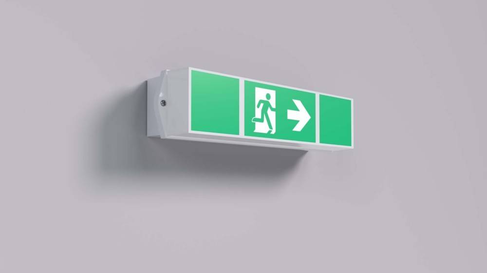 Ausgang-Schild mit Symbol einer Person, die durch eine Tür geht, und einem Pfeil, der nach rechts zeigt, zur Anzeige der Notausgangsrichtung.