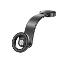 Ein schwarzes magnetisches Wandhalter für eine Zahnbürste mit eleganten S-förmigen Design und runden magnetischen Basen an beiden Enden.