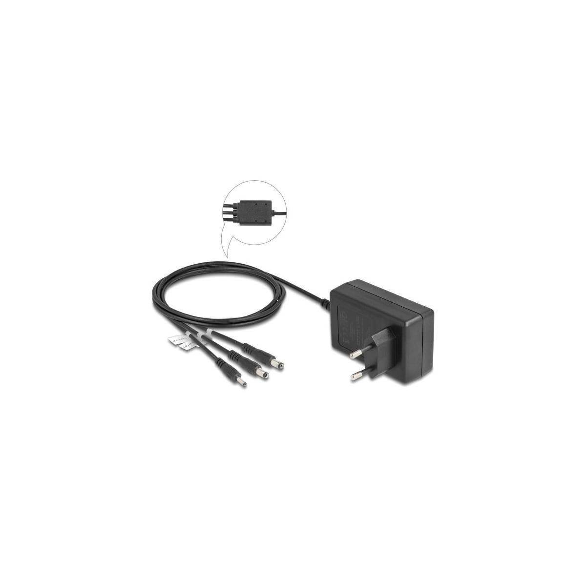 Schwarzer Netzteil mit Stecker und Doppelkabel, eine Nahaufnahme der Anschluss-Stifte zeigend, verwendet zum Aufladen elektronischer Geräte.