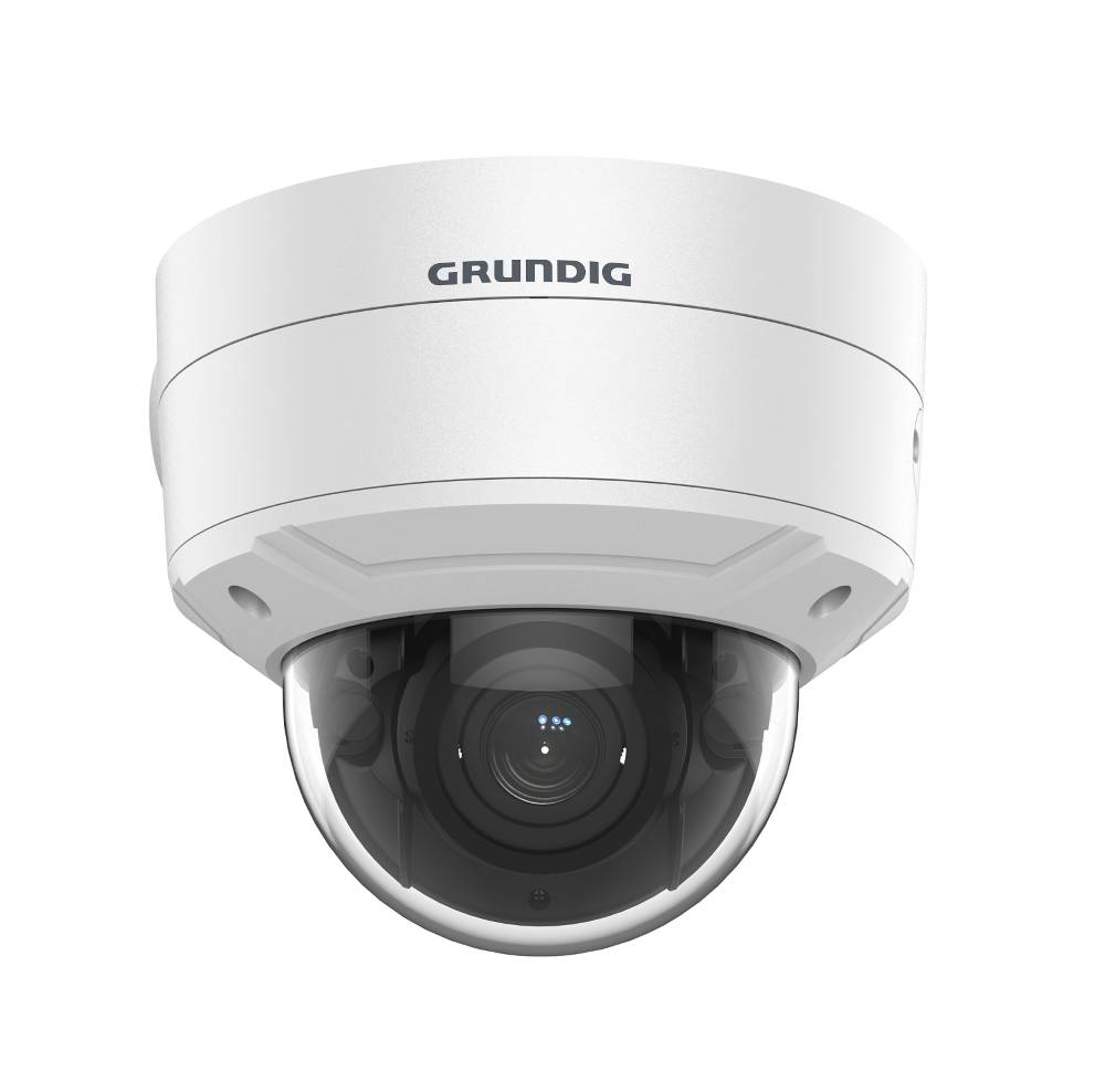 Weiße Grundig-Domensicherheitskamera mit sichtbarem Objektiv, Vorderansicht auf einfachem Hintergrund.