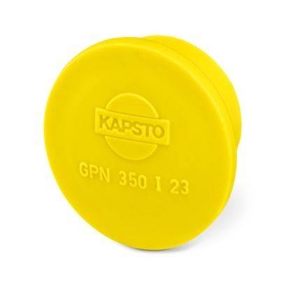 Eine gelbe Kunststoffkappe mit geprägtem Text: „KAPSTO GPN 350 I 23.