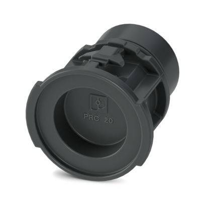 Eine schwarze kreisförmige Kunststoffkomponente mit der Bezeichnung 'PRC 20', die einen Flansch und einen Verriegelungsmechanismus aufweist und wahrscheinlich Teil einer technischen Baugruppe ist.