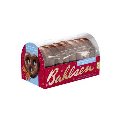 Verpackte Schokoladenringkuchen in einer durchsichtigen roten Schachtel mit Deckel, gekennzeichnet mit 