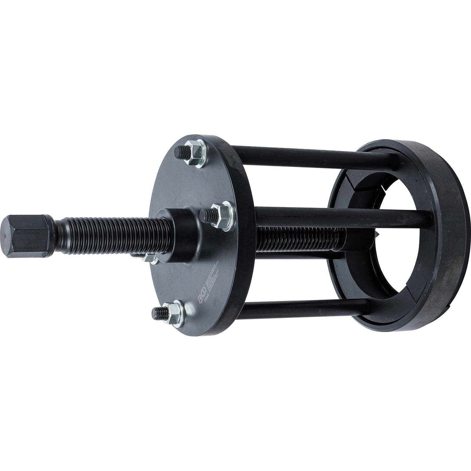 Ein schwarzer mechanischer Abzieher mit einem Gewindestift und einer kreisförmigen Basis, der zum Entfernen von Zahnrädern oder Lagern von Maschinenteilen verwendet wird.