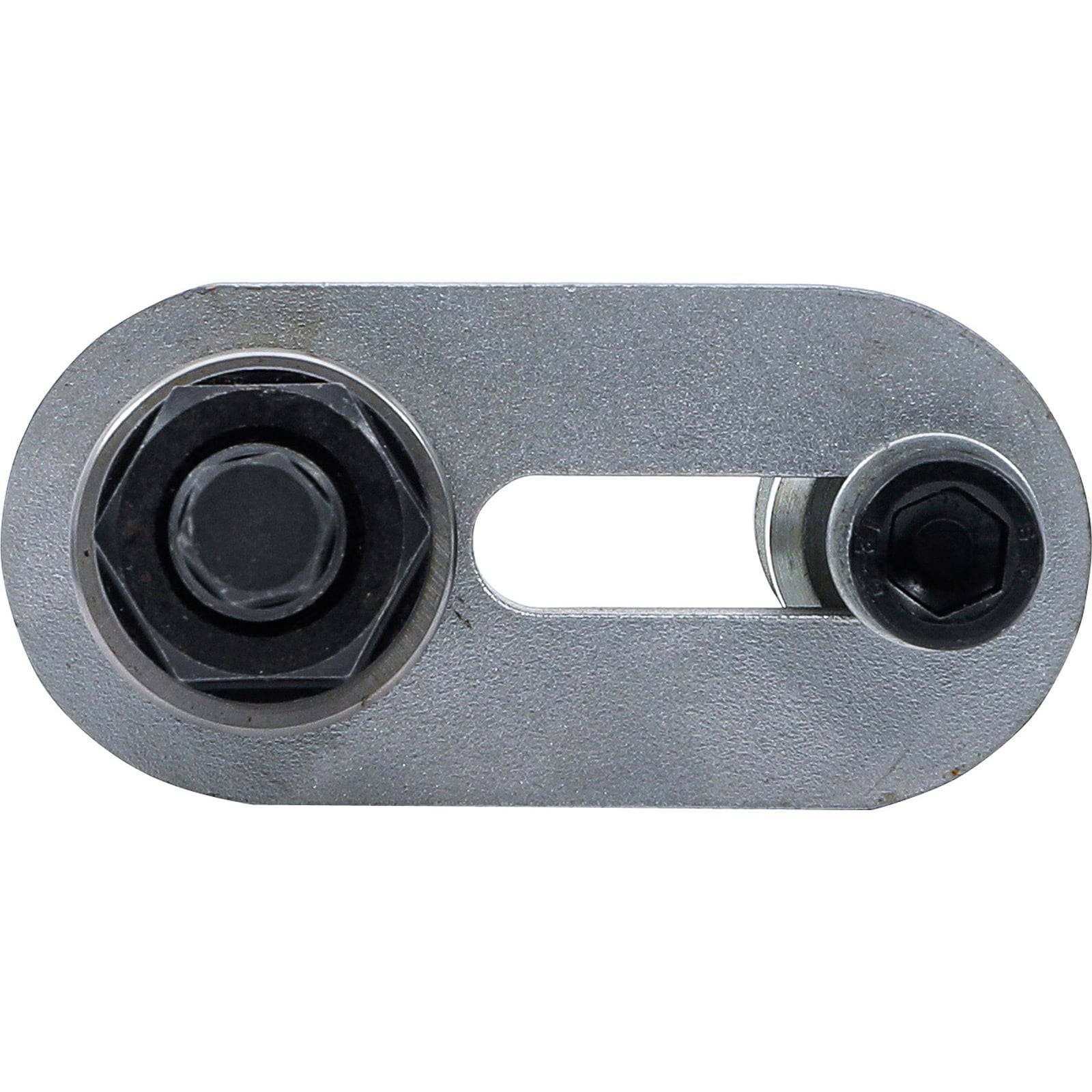 Ein Metallspanner mit zwei Schrauben; die linke Schraube ist größer und schwarz, und die rechte Schraube ist kleiner. Verwendet zum Justieren der Spannung in Maschinen.