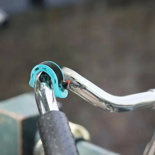 Q-förmige Fahrradklingel kompaktes Design am Lenker aus Aluminium, Kunststoff Blau Q-förmige Fahrradklingel kompaktes Design am Lenker aus Aluminium, Kunststoff Blau