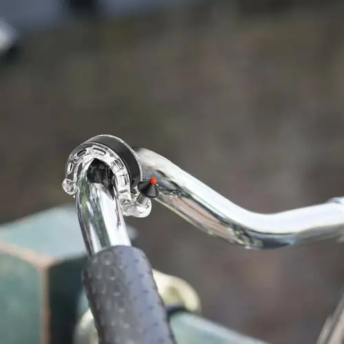 Q-förmige Fahrradklingel kompaktes Design am Lenker aus Aluminium, Kunststoff Transparent Q-förmige Fahrradklingel kompaktes Design am Lenker aus Aluminium, Kunststoff Transparent
