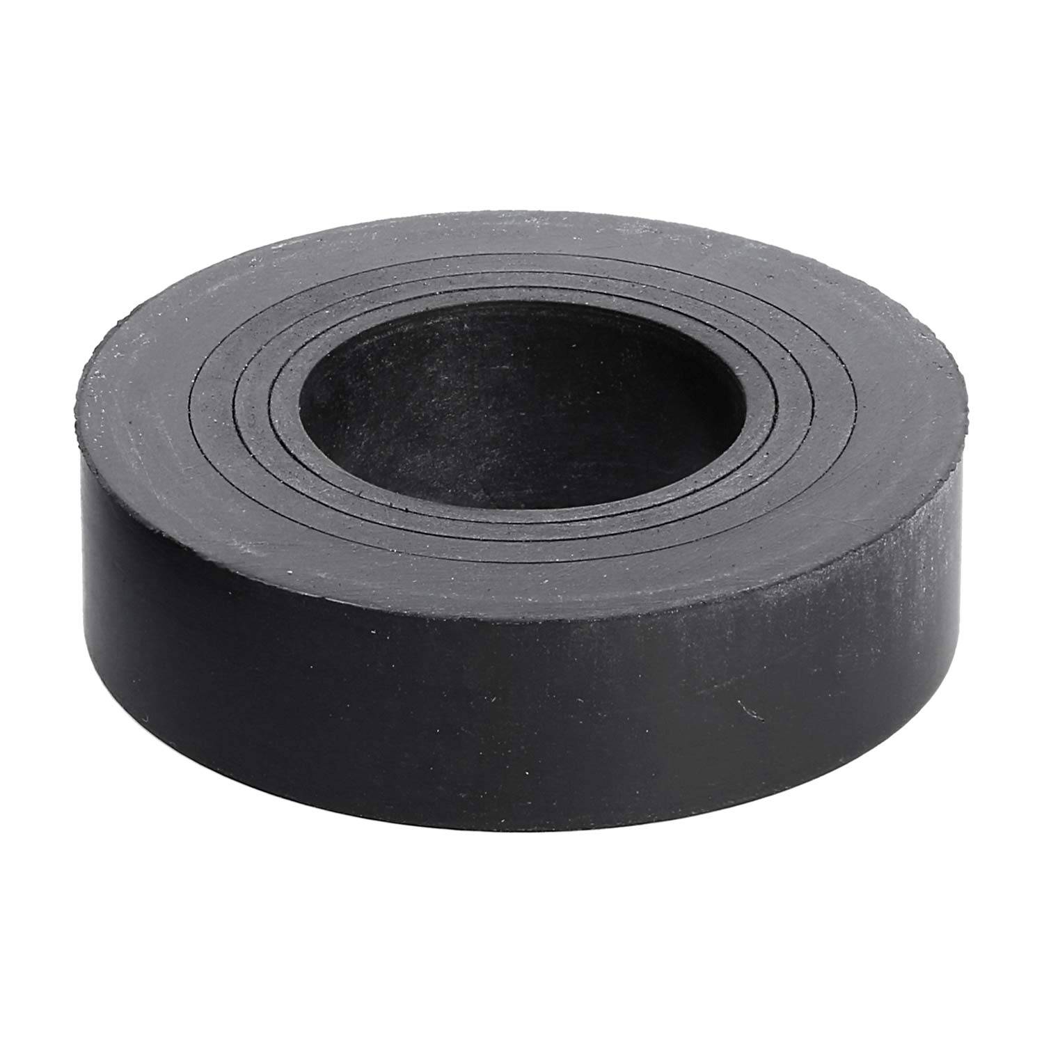 Eine schwarze Gummidichtung mit kreisförmiger Gestalt und einer zentralen Öffnung, die zur Abdichtung oder Abstandshalterung in mechanischen Anwendungen verwendet wird.