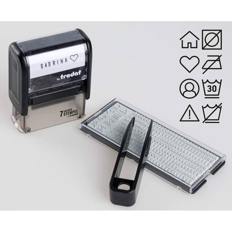 Ein anpassbares Gummistempel-Set mit einem selbstfärbenden Stempel mit der Aufschrift 