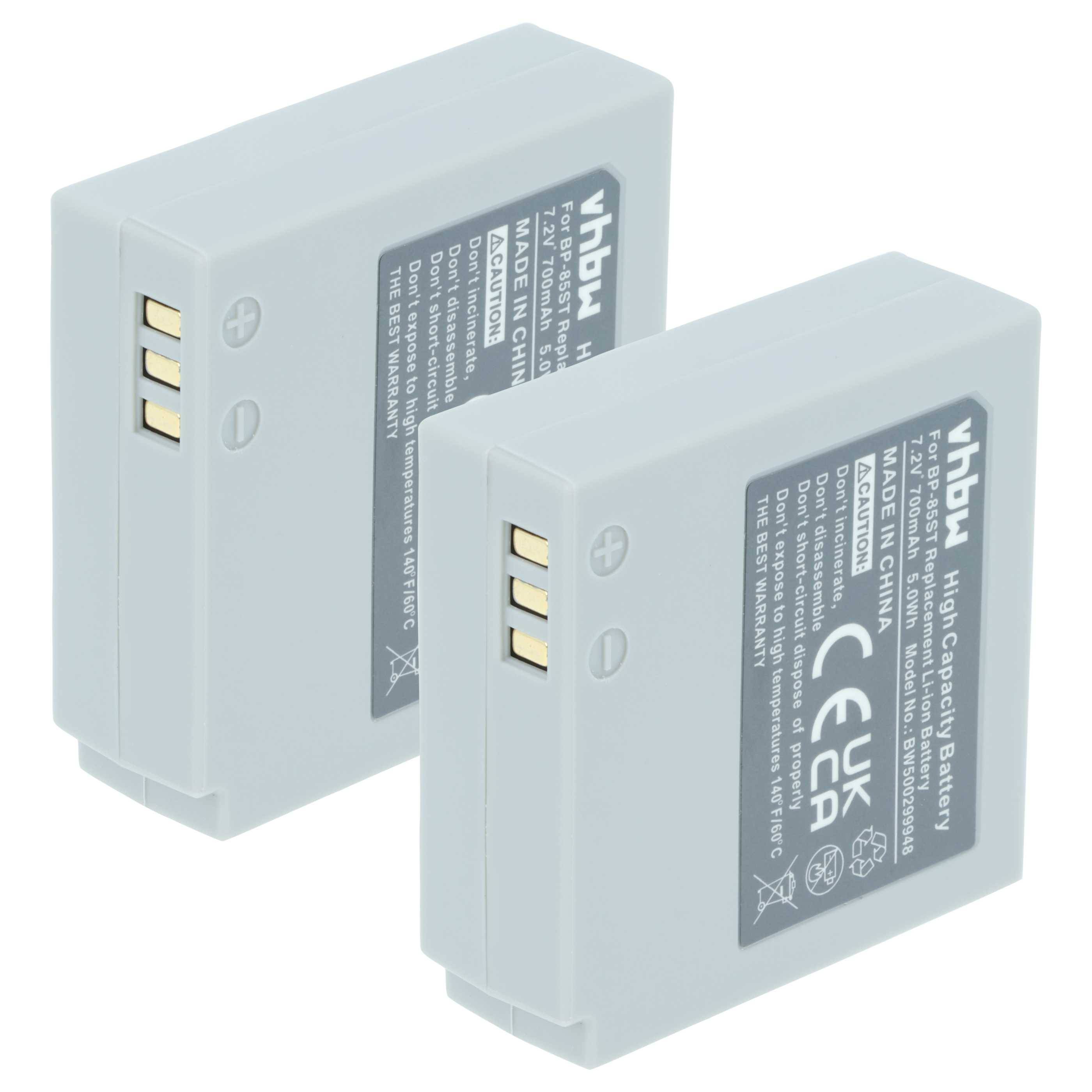 Zwei graue rechteckige Batterien mit sichtbaren Kontaktpunkten und aufgedruckten Sicherheitsinformationen, entwickelt als Ersatz für die Verwendung in Kameras.