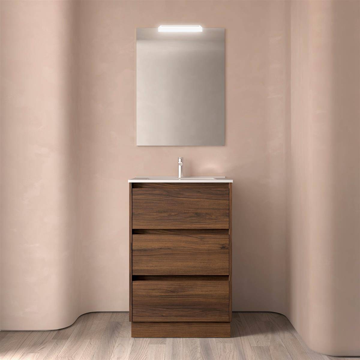 Modernes Badezimmer-Waschtisch mit Holzschrank, weißem Waschbecken, rechteckigem Spiegel und Überkopfleuchte an geschwungenen beigen Wänden.