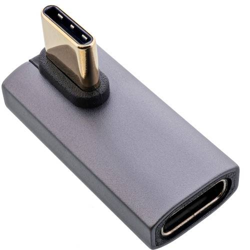 Ein 'USB-C zu USB-Adapter' zeigt einen kleinen, rechteckigen Konverter mit einem USB-C-Stecker auf der einen Seite und einem USB-Anschluss auf der anderen Seite.